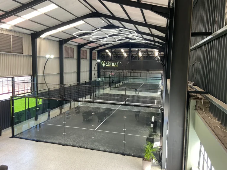 View over the indoor courts from the upper level at Arturf Padel Arena