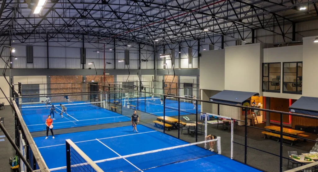 Courts and clubhouse seating at Padel 365 Century City