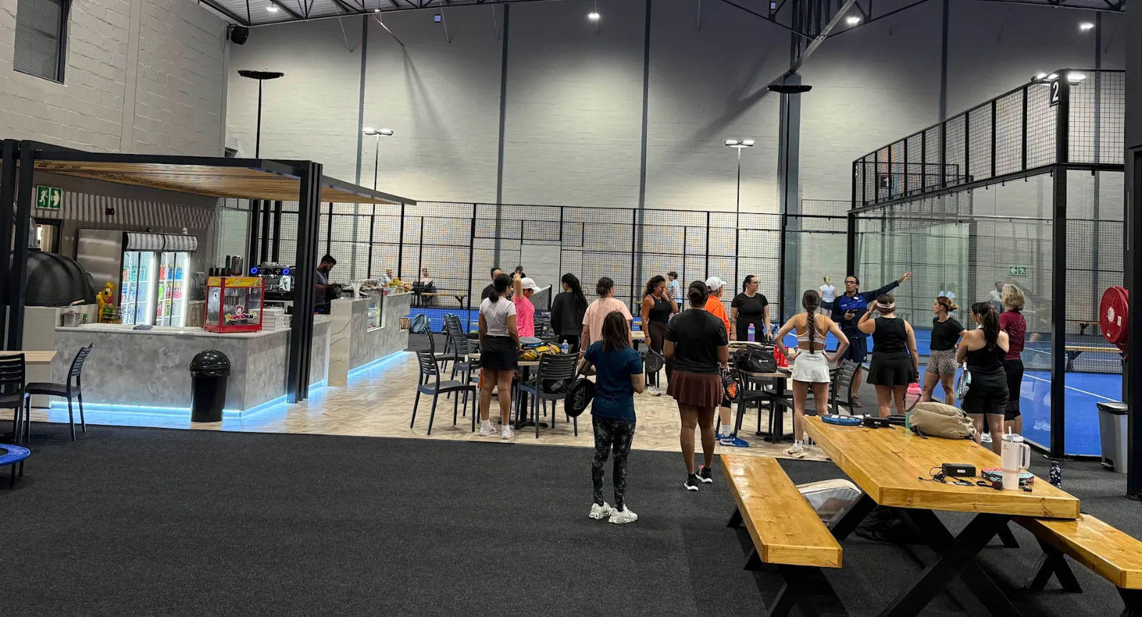 A social session on court at Padel 365 Richmond Park