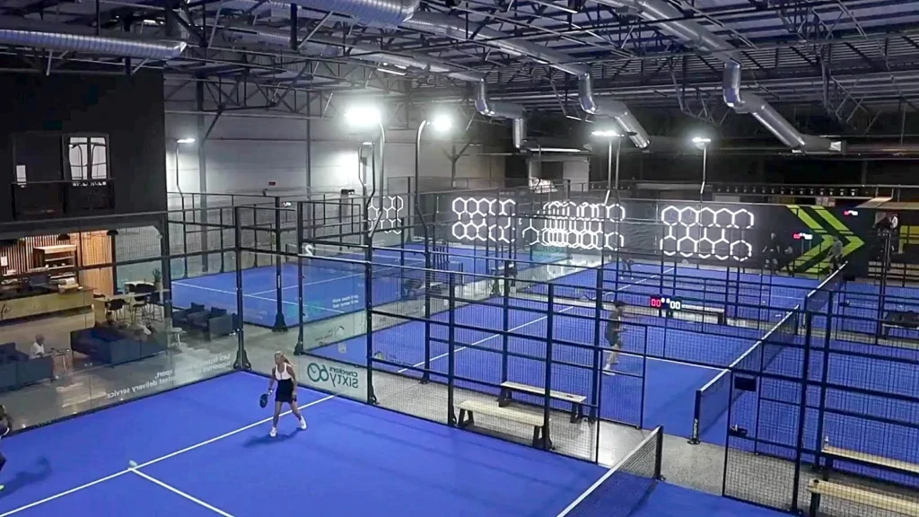 Indoor panoramic padel courts under the hexagon lights at PadelX Somerset West