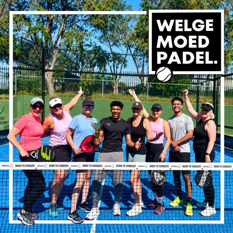Players celebrating a social tournament win on court at Welgemoed Padel